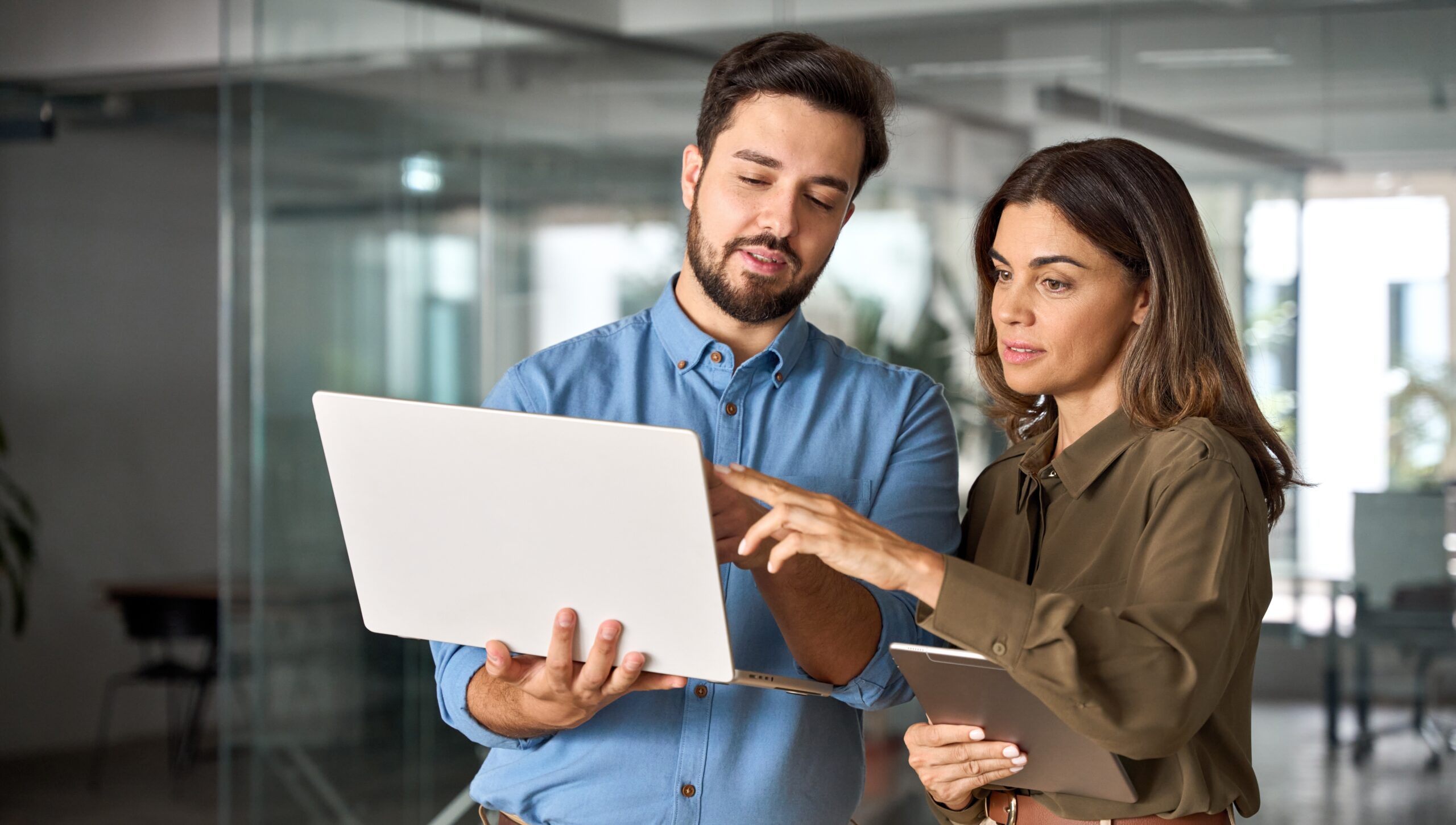Business people reviewing their website’s traffic and SEO strategy.
